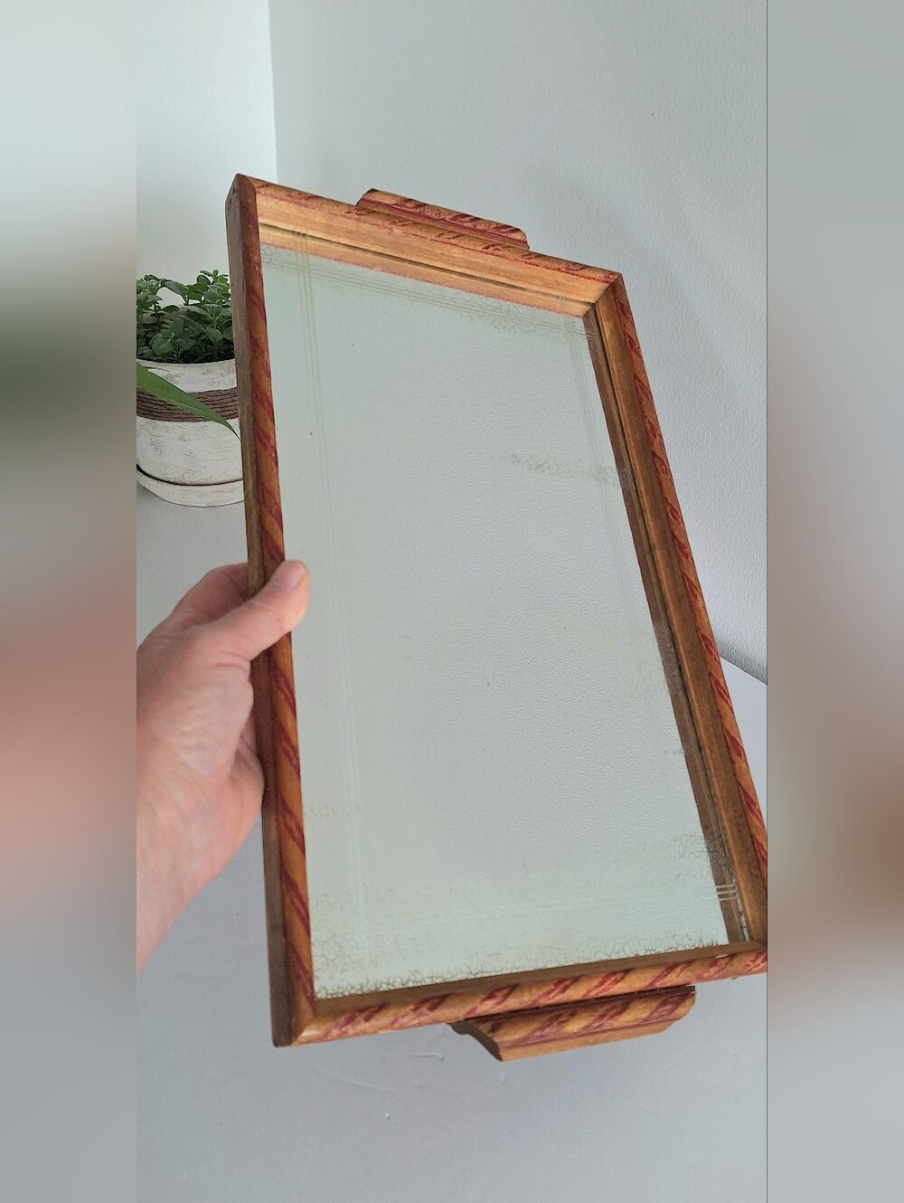 Antique wooden tray with a mirror